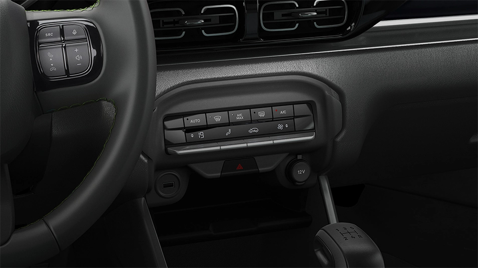 Ar-condicionado digital e automático Painel de comandos do ar-condicionado do Citroën C3 com ajustes digitais de temperatura, ventilação e desembaçamento.